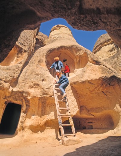 Tourists Exploring Cave Houses by Unbekannt Unbekannt